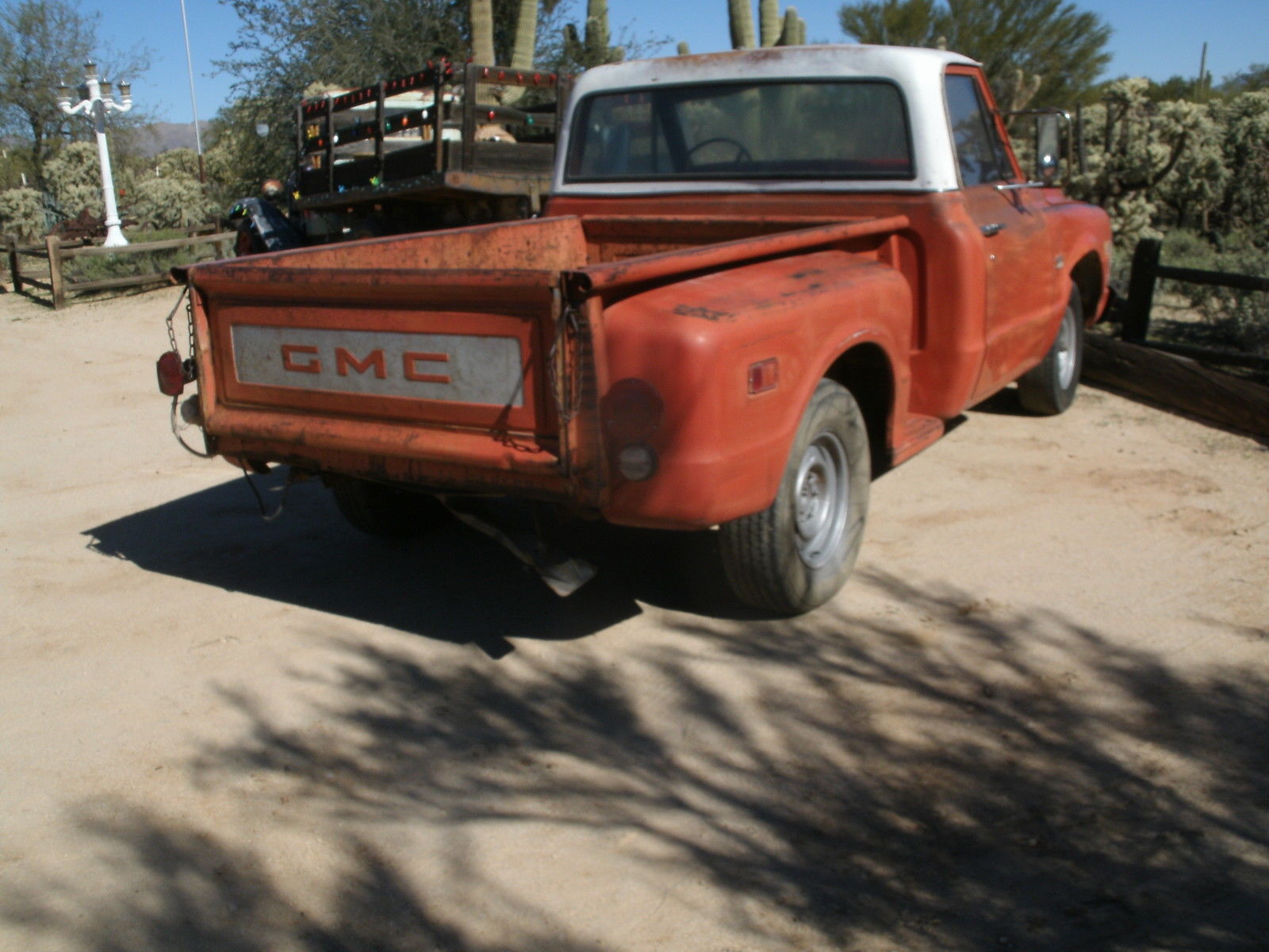 1968 red and white GMC Sierra 1500 Short Bed Step Side