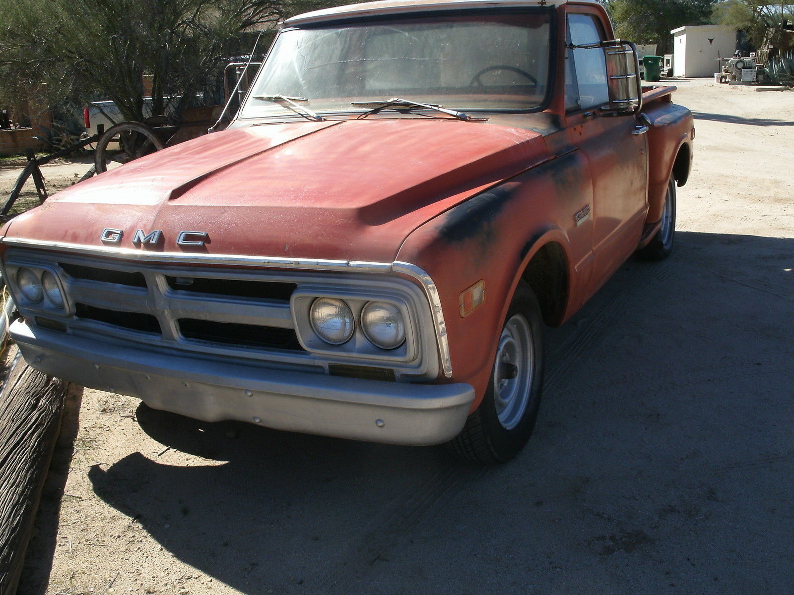 1968 red and white GMC Sierra 1500 Short Bed Step Side