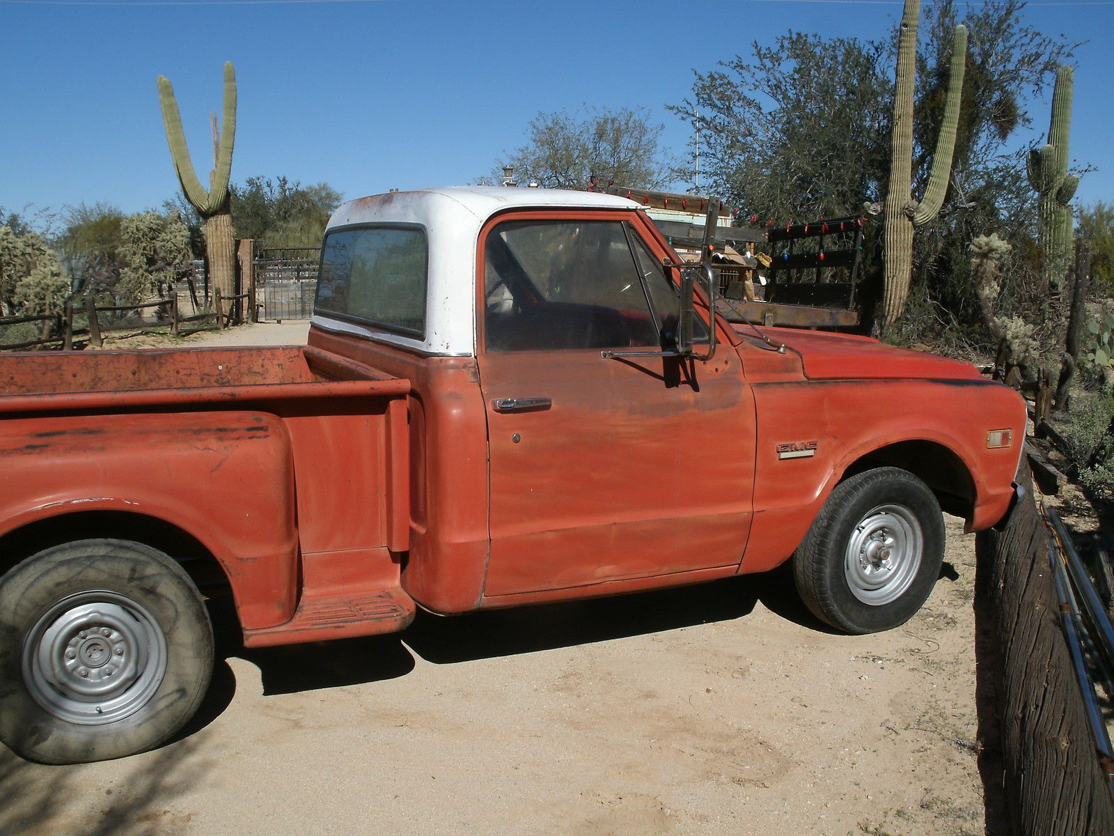 1968 red and white GMC Sierra 1500 Short Bed Step Side