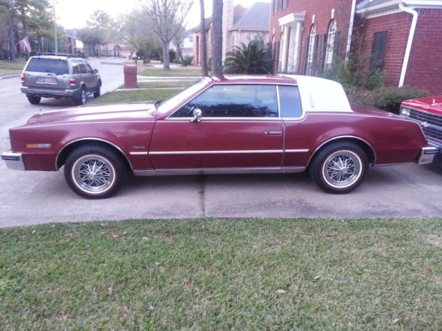 1985 Red Oldsmobile Toronado Coupe