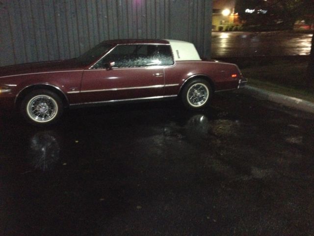 1985 Red Oldsmobile Toronado Coupe