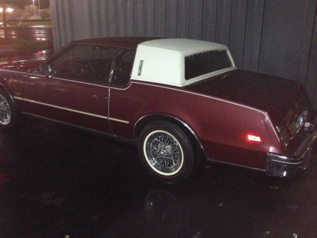 1985 Red Oldsmobile Toronado Coupe