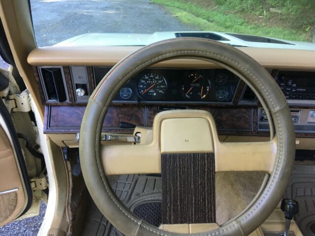 1986 Yellow Dodge 600 Convertible