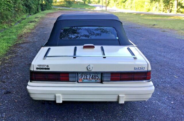 1986 Yellow Dodge 600 Convertible