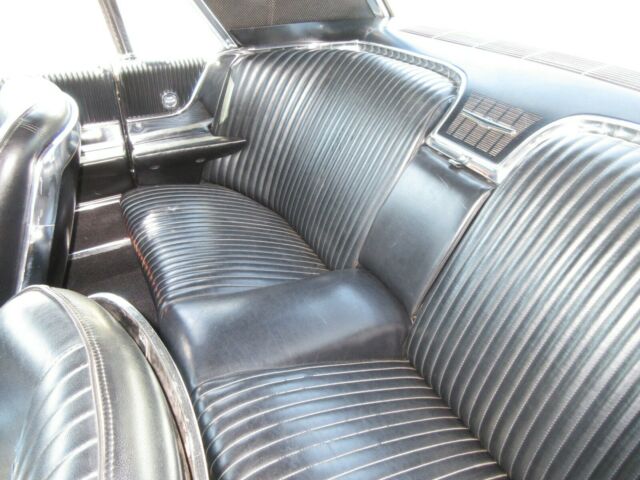 1965 Burgundy Ford Thunderbird Coupe