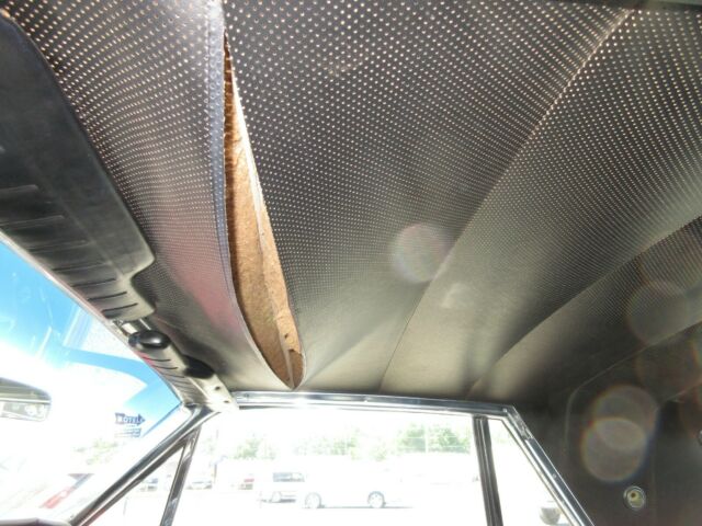 1965 Burgundy Ford Thunderbird Coupe