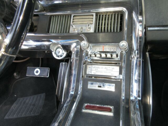 1965 Burgundy Ford Thunderbird Coupe