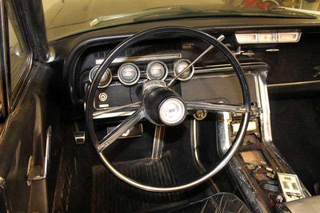 1966 Burgundy Ford Thunderbird Convertible