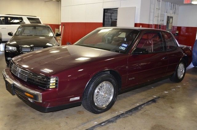 1988 Burgundy Oldsmobile Toronado Coupe