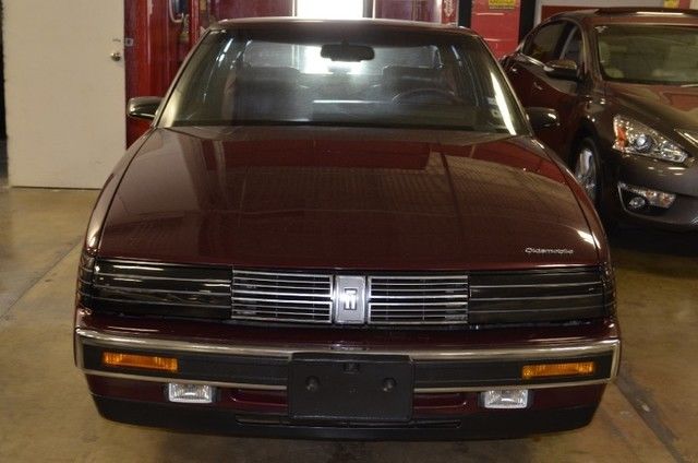 1988 Burgundy Oldsmobile Toronado Coupe