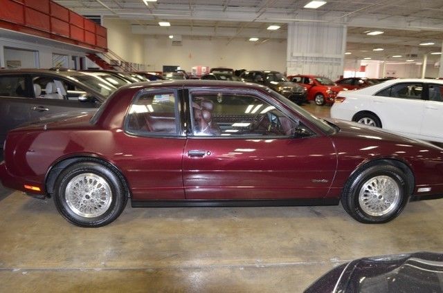1988 Burgundy Oldsmobile Toronado Coupe