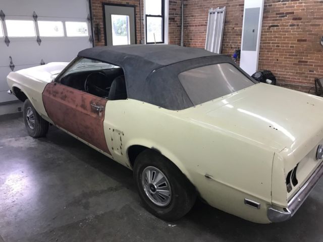 1969 cream Ford Mustang Convertible