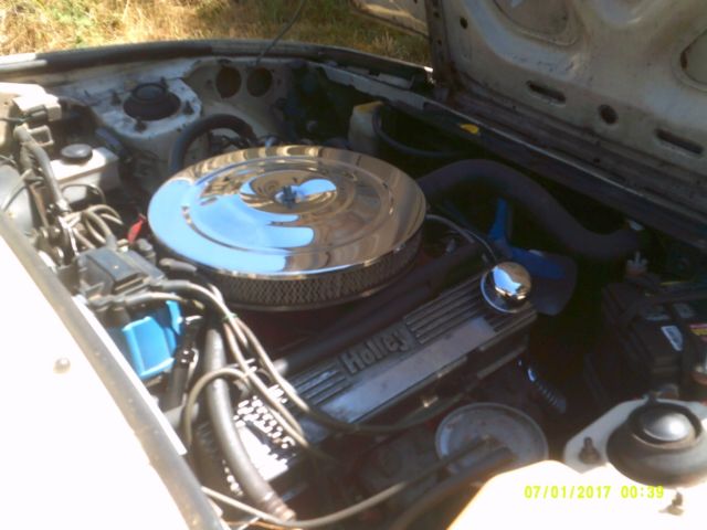 1985 beige Mazda RX-7 Coupe