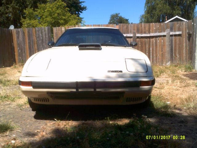 1985 beige Mazda RX-7 Coupe