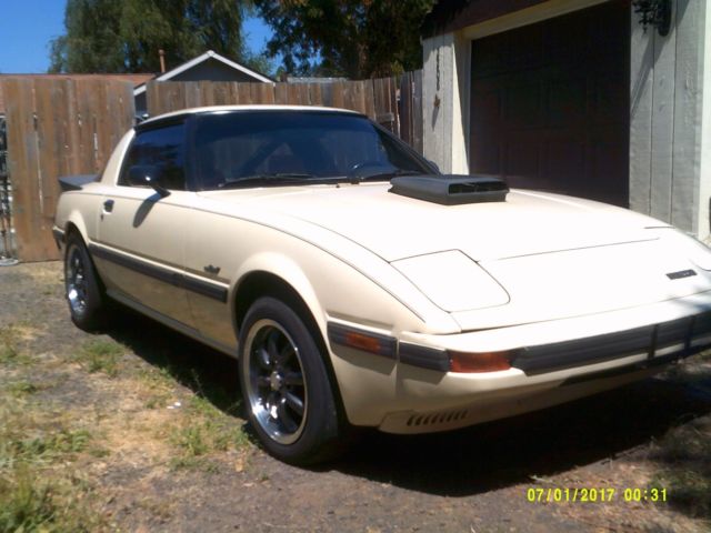 1985 beige Mazda RX-7 Coupe