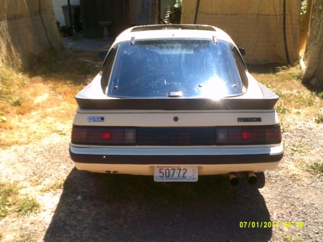 1985 beige Mazda RX-7 Coupe