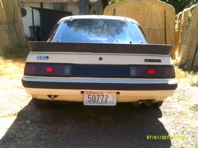 1985 beige Mazda RX-7 Coupe