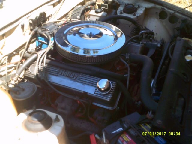 1985 beige Mazda RX-7 Coupe