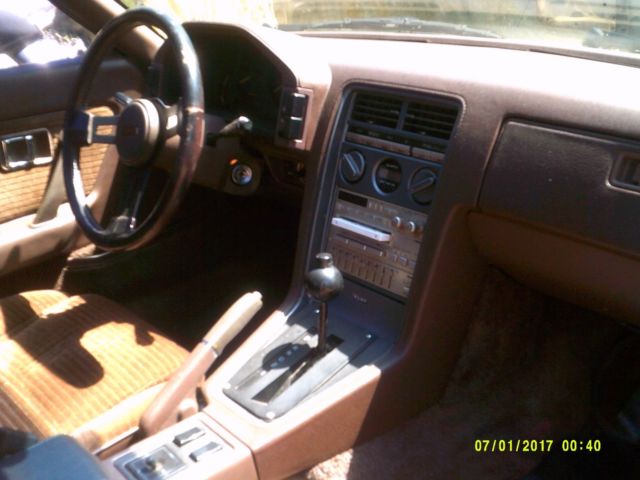 1985 beige Mazda RX-7 Coupe