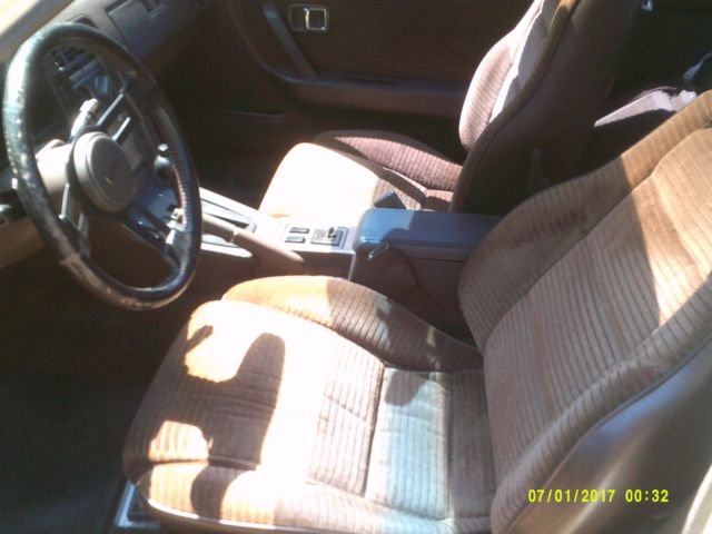 1985 beige Mazda RX-7 Coupe