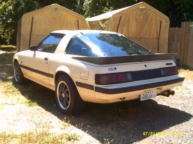 1985 beige Mazda RX-7 Coupe