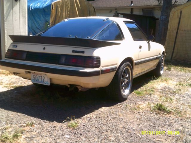 1985 beige Mazda RX-7 Coupe