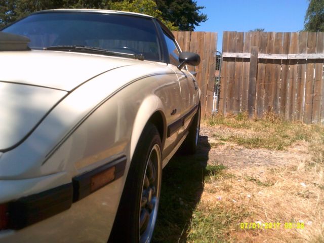 1985 beige Mazda RX-7 Coupe