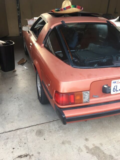 1979 Orange Mazda RX-7 Coupe