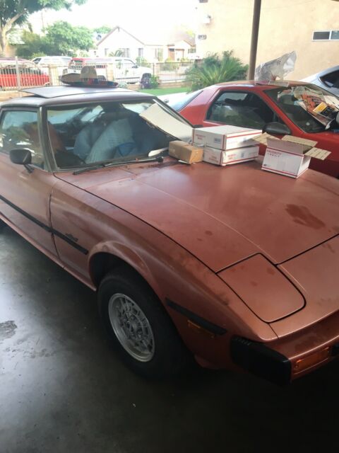 1979 Orange Mazda RX-7 Coupe