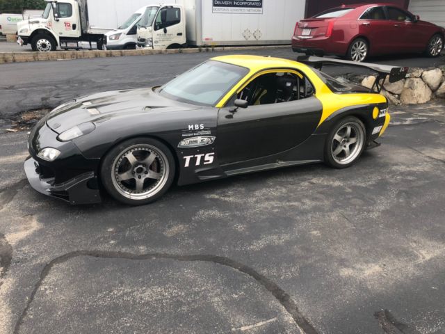 1993 Yellow Mazda RX-7 Coupe
