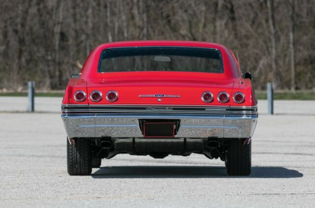 1965 Red Chevrolet Impala Coupe