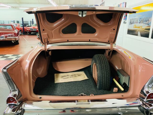 1957 Salmon Chevrolet Bel Air/150/210 Sedan