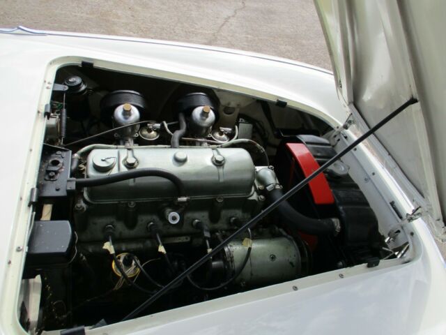 1955 White and Red Austin Healey 100-4 Convertible