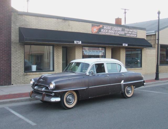 1954 White over Brown Plymouth Savoy Sedan