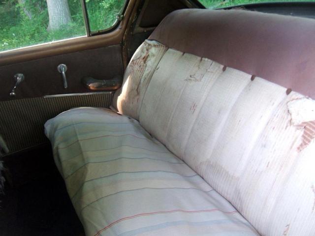 1954 White over Brown Plymouth Savoy Sedan