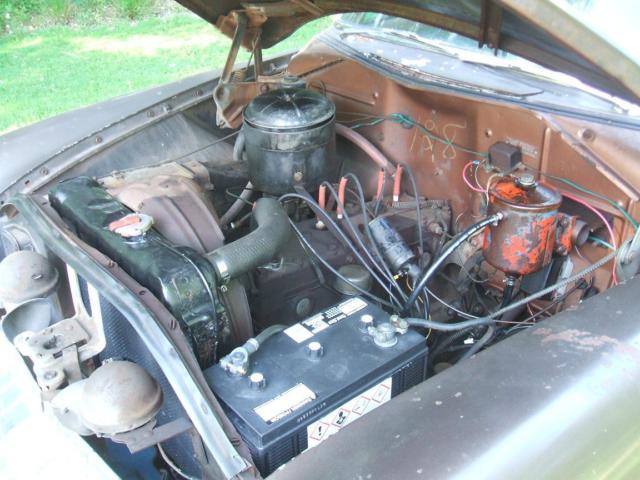 1954 White over Brown Plymouth Savoy Sedan