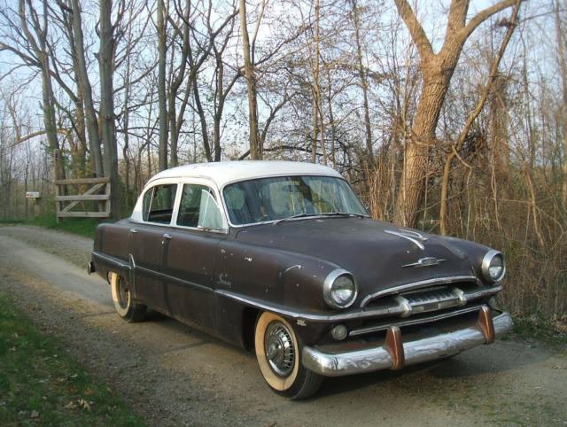 1954 White over Brown Plymouth Savoy Sedan