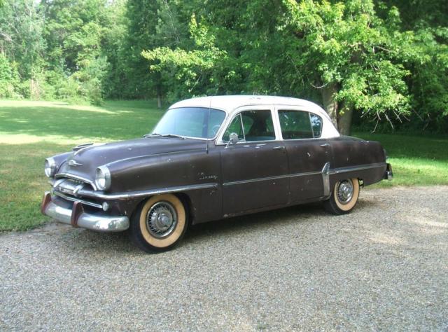 1954 White over Brown Plymouth Savoy Sedan