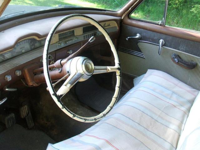 1954 White over Brown Plymouth Savoy Sedan