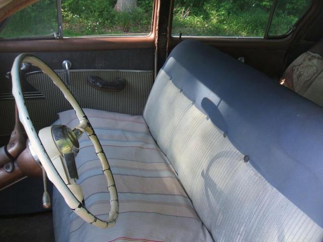1954 White over Brown Plymouth Savoy Sedan