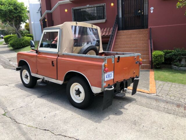 1972 Orange Land Rover Defender Wagon