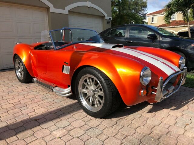 1965 Metallic orange Ford Cobra