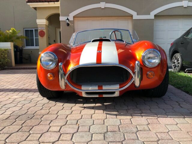 1965 Metallic orange Ford Cobra