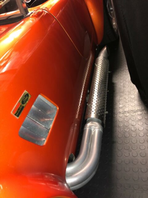 1965 Metallic orange Ford Cobra