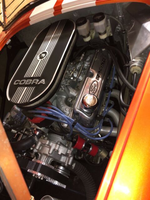 1965 Metallic orange Ford Cobra