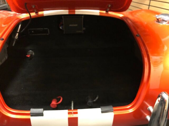 1965 Metallic orange Ford Cobra