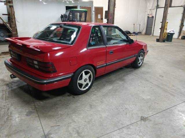 1989 Red Dodge Shadow Coupe