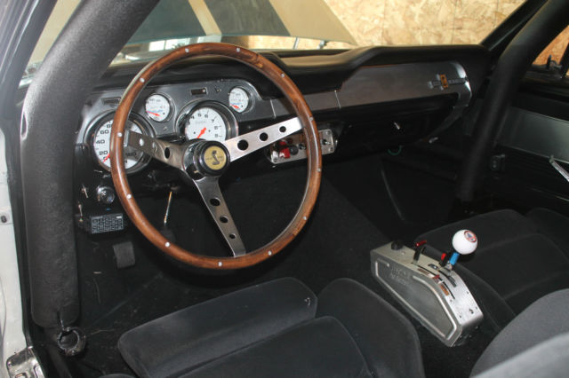 1967 white w/blue stripes Ford Mustang