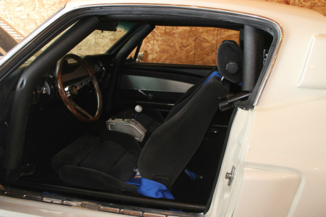 1967 white w/blue stripes Ford Mustang