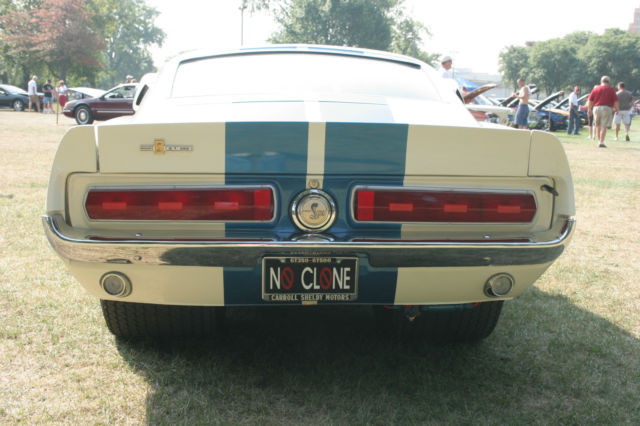 1967 white w/blue stripes Ford Mustang